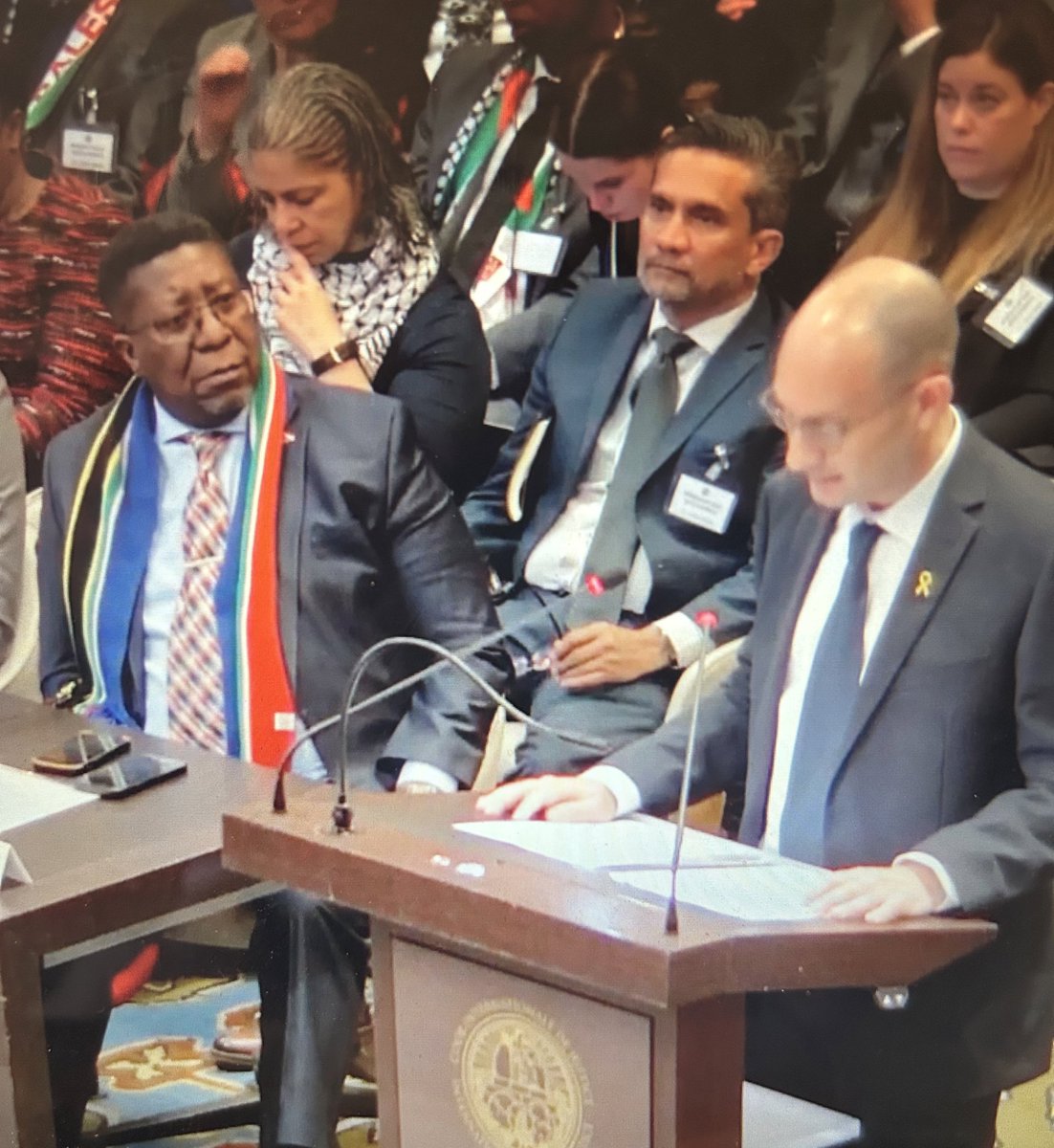 I love how uncle stayed like this throughout the proceedings to let Israel know South Africa always has Palestine’s back.