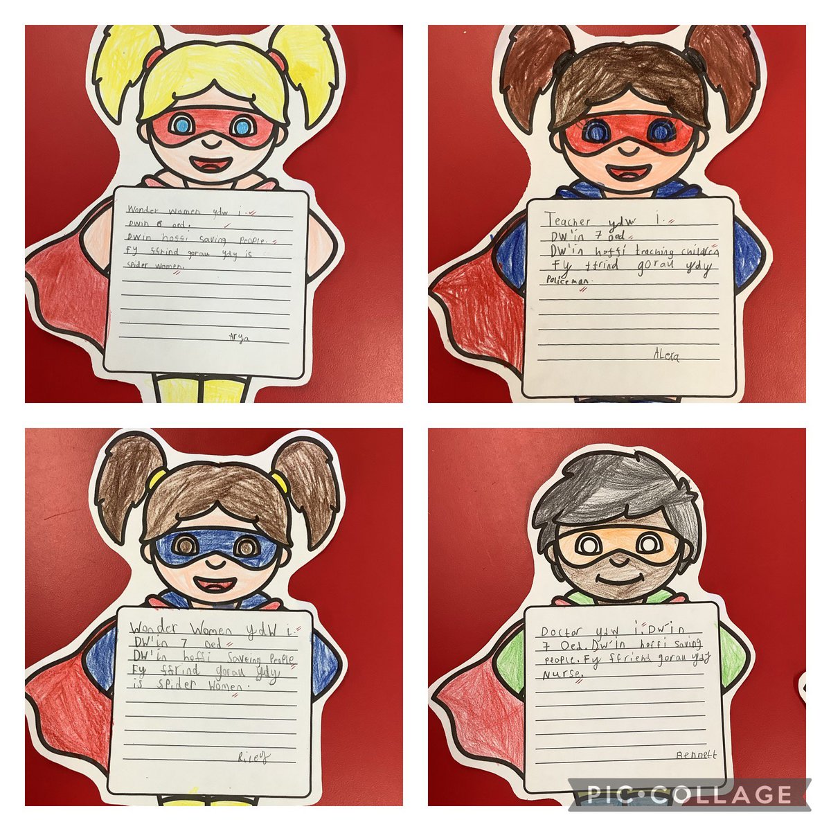 SJLCARDIFF's tweet photo. #Year2 have used their Welsh skills to describe who they have come to school as today to celebrate our new topic, #Superheroes. #WelshWriting #Article28 @CSCSiarterIaith @CSC_Cymraeg https://t.co/3nVyQaTTB6