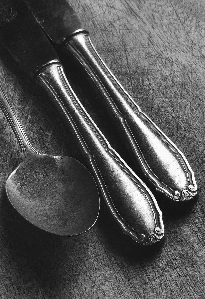 EndaCavanagh's tweet photo. I came across some old digital scans I did from some Ilford Delta 100 negative film. The photos were captured about 30 years ago in Berlin. I found the cutlery at the flea market in Tiergarten and the background was a breadboard!  

#fineartphotography #blackandwhitephoto https://t.co/zny3vbbzYR