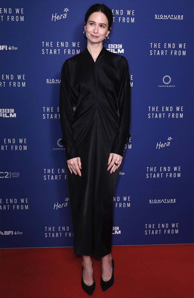 Katherine Waterston wore a Lanvin long sleeve draped midi dress while attending the #TheEndWeStartFrom première in London.