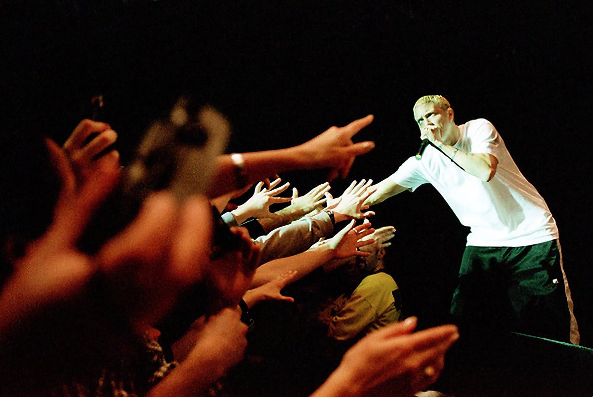 Eminem performing at the CEPSUM centre located on the campus of the University of Montreal in Montreal, Canada on April 21, 2000. Fellow New York rapper Pharoahe Monch was also present as a special guest. Em performed some tracks from his upcoming album, MMLP. 
📸: Pierre Roussel