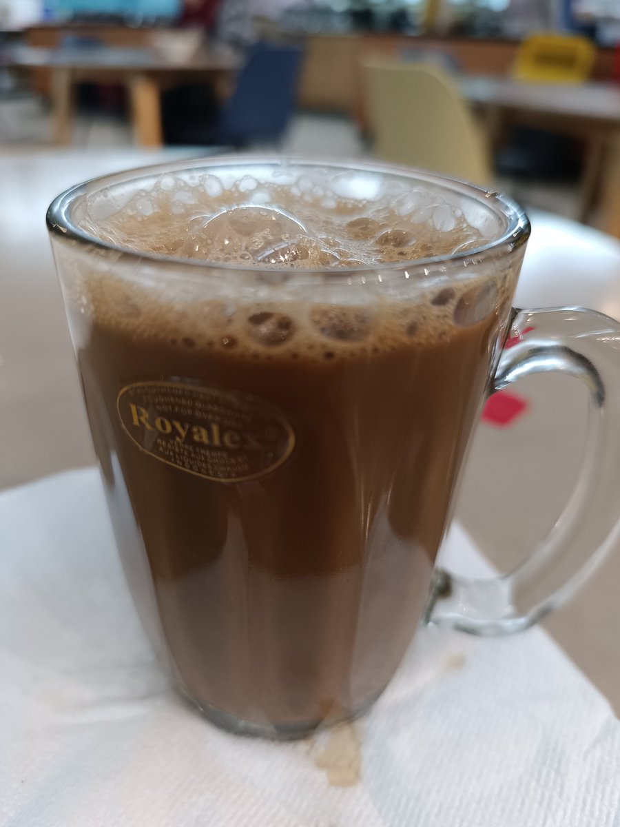 The name of this drink is 'Kopi Tarik Nyaman Kurang Manis' and it is only available upon request at Cafe SIRIM, and the only client who is 'weird' enough to order such complicated drinks is... me 😀😀.