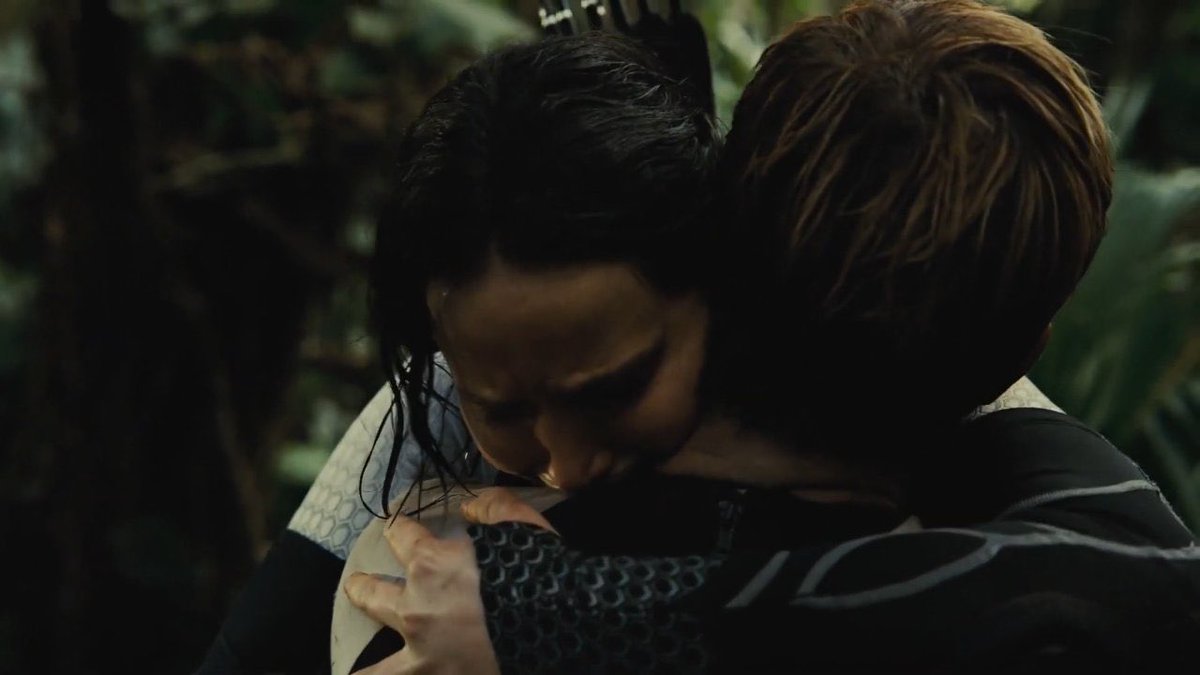 o finnick percebendo que a katniss ama o peeta de verdade
