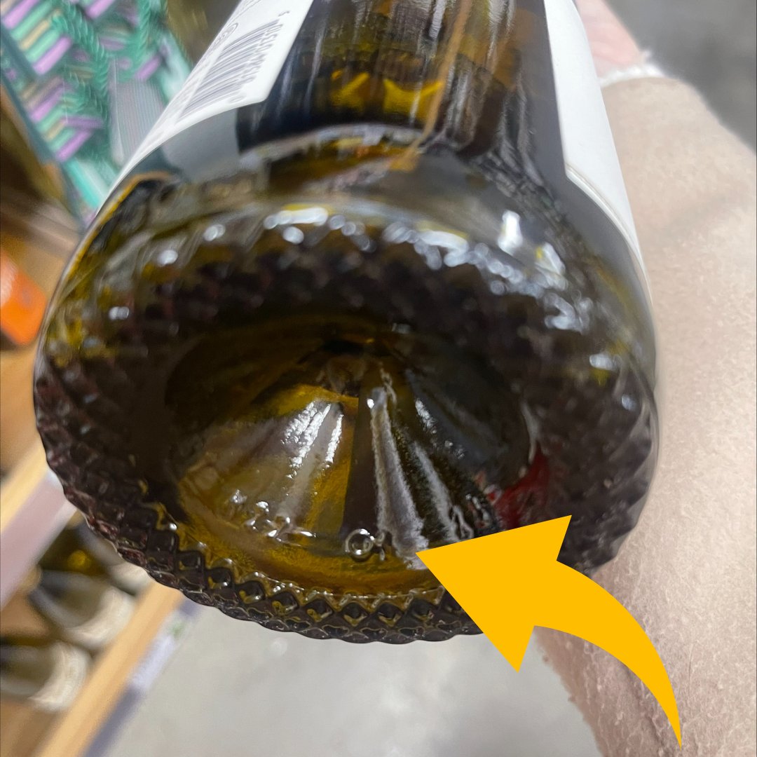 The bottom of your bottle can tell you a lot!  Flip over your bottle to learn how brands make packaging decisions. Like how was the glass sourced? Was it made from pure glass (recycled content)? Was it made using unknown materials?  Did it travel far? Look for the puntmark!