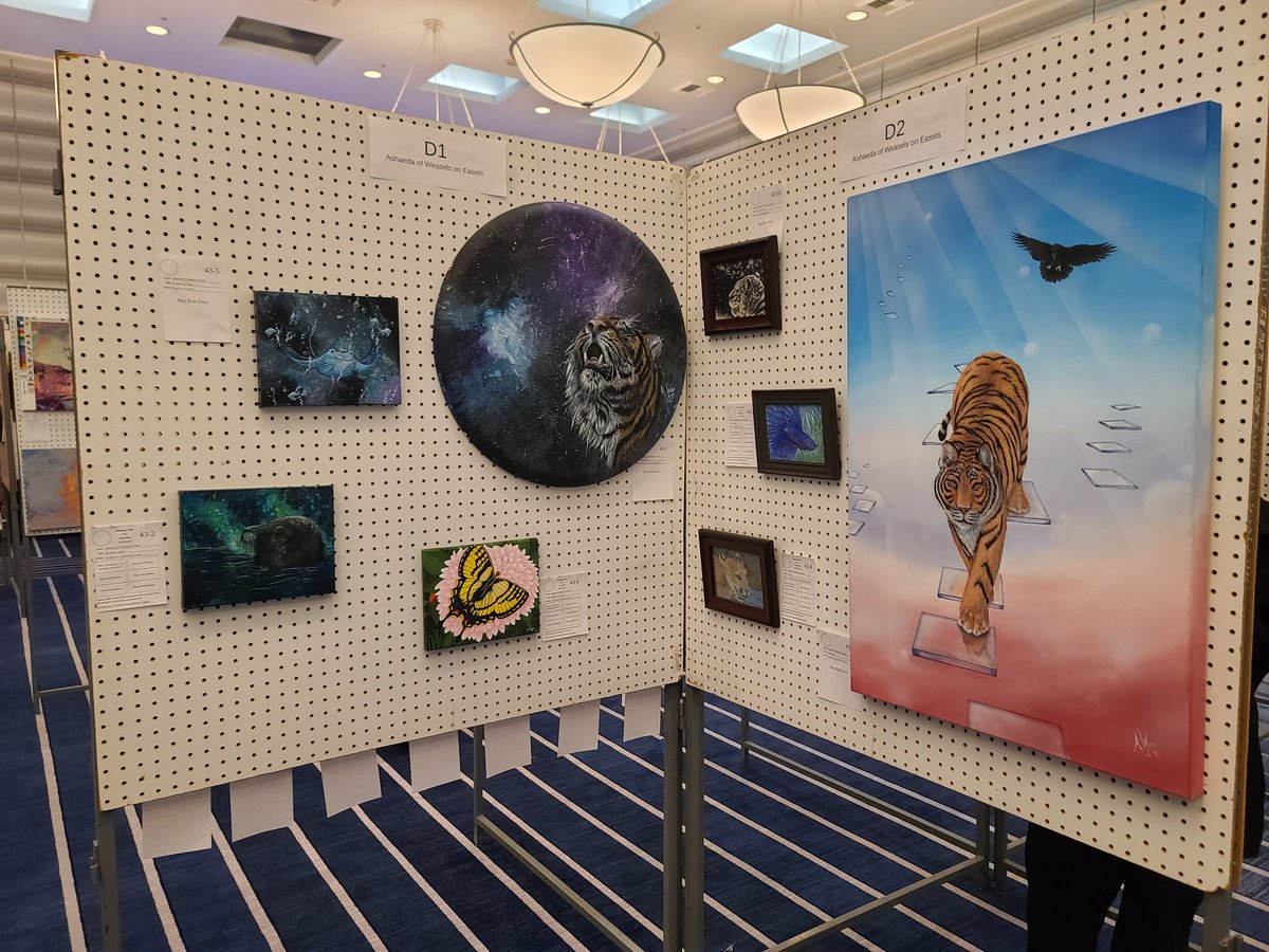 WeaselsOnEasels's tweet photo. My display is up in the art show at Further Confusion! 

4 of these are available on auction so check it out if you've been wanting an original from me. These are all the actual, physical paintings. 

#art #artist #acrylicpaints #scratchboard #coloredpencil #watercolorpainting https://t.co/lPt9XGUZGF