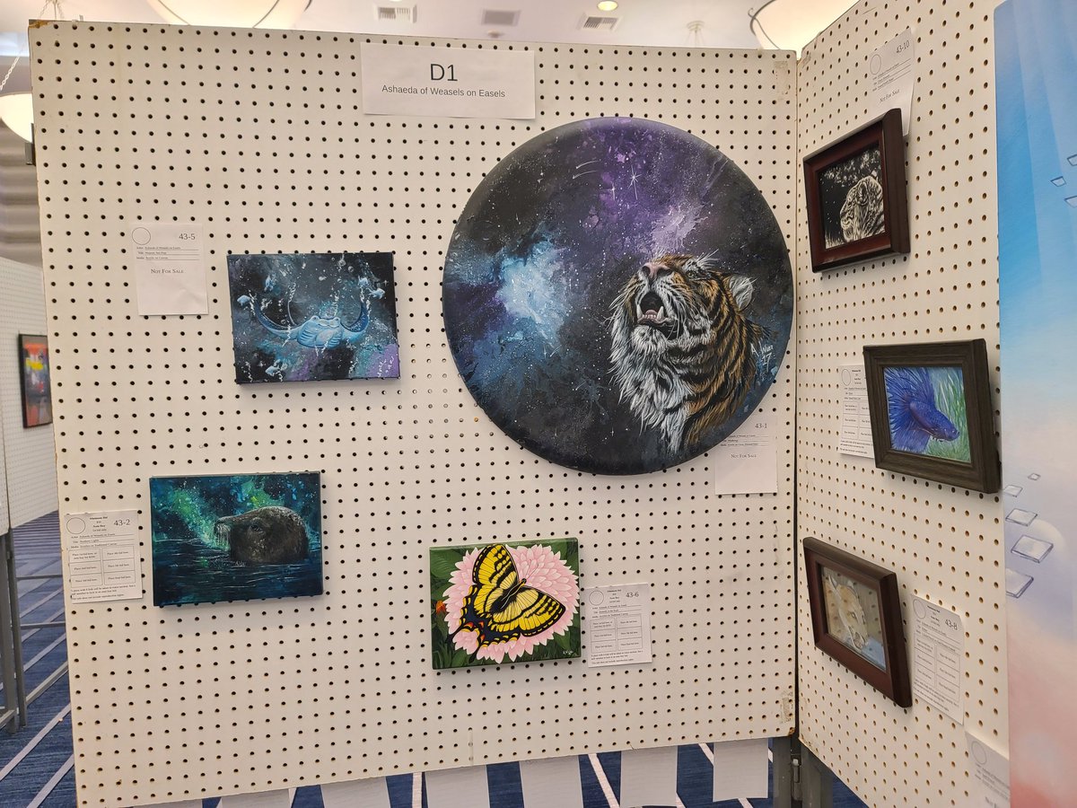 WeaselsOnEasels's tweet photo. My display is up in the art show at Further Confusion! 

4 of these are available on auction so check it out if you've been wanting an original from me. These are all the actual, physical paintings. 

#art #artist #acrylicpaints #scratchboard #coloredpencil #watercolorpainting https://t.co/lPt9XGUZGF