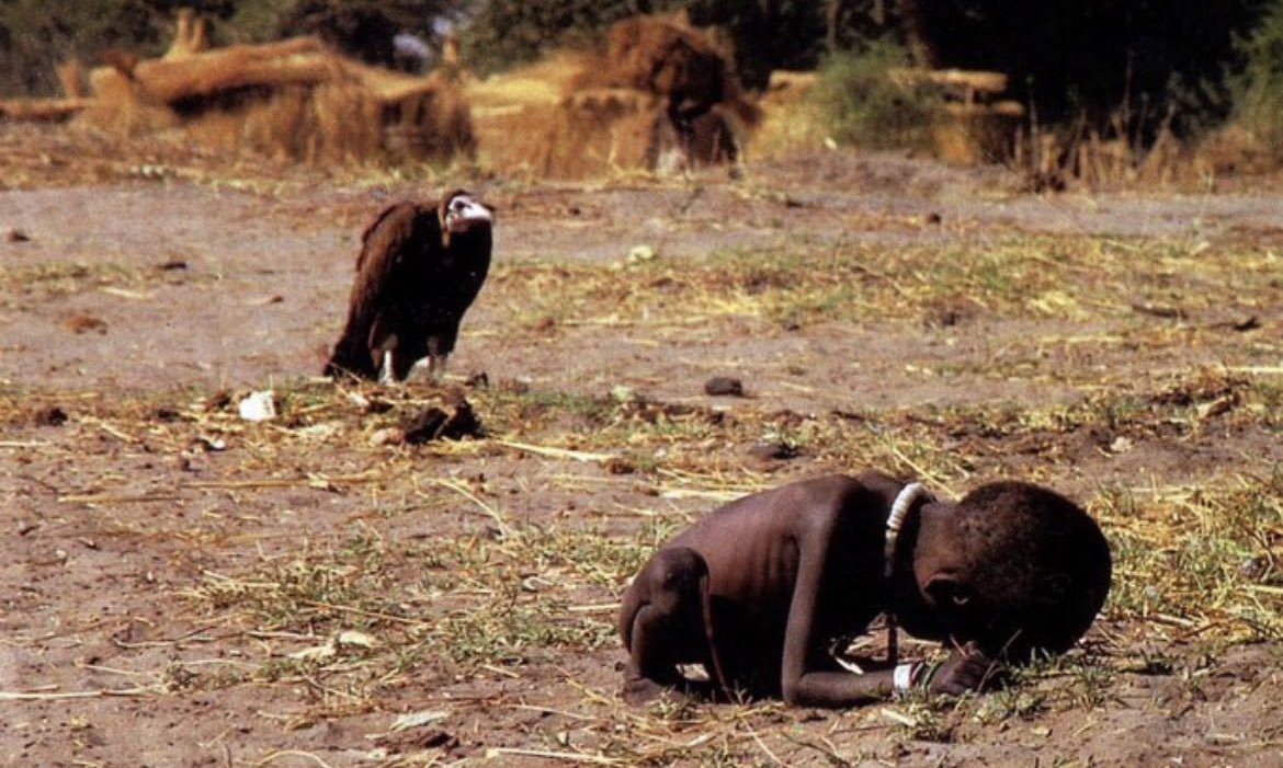 This photograph was taken by Kevin Carter in Sudan in 1993. The image depicts a famine-stricken child, with a hooded vulture eyeing him from nearby. Shortly after the picture was snapped, Carter chased the vulture away.

The photograph first appeared on 26 March 1993 in the New