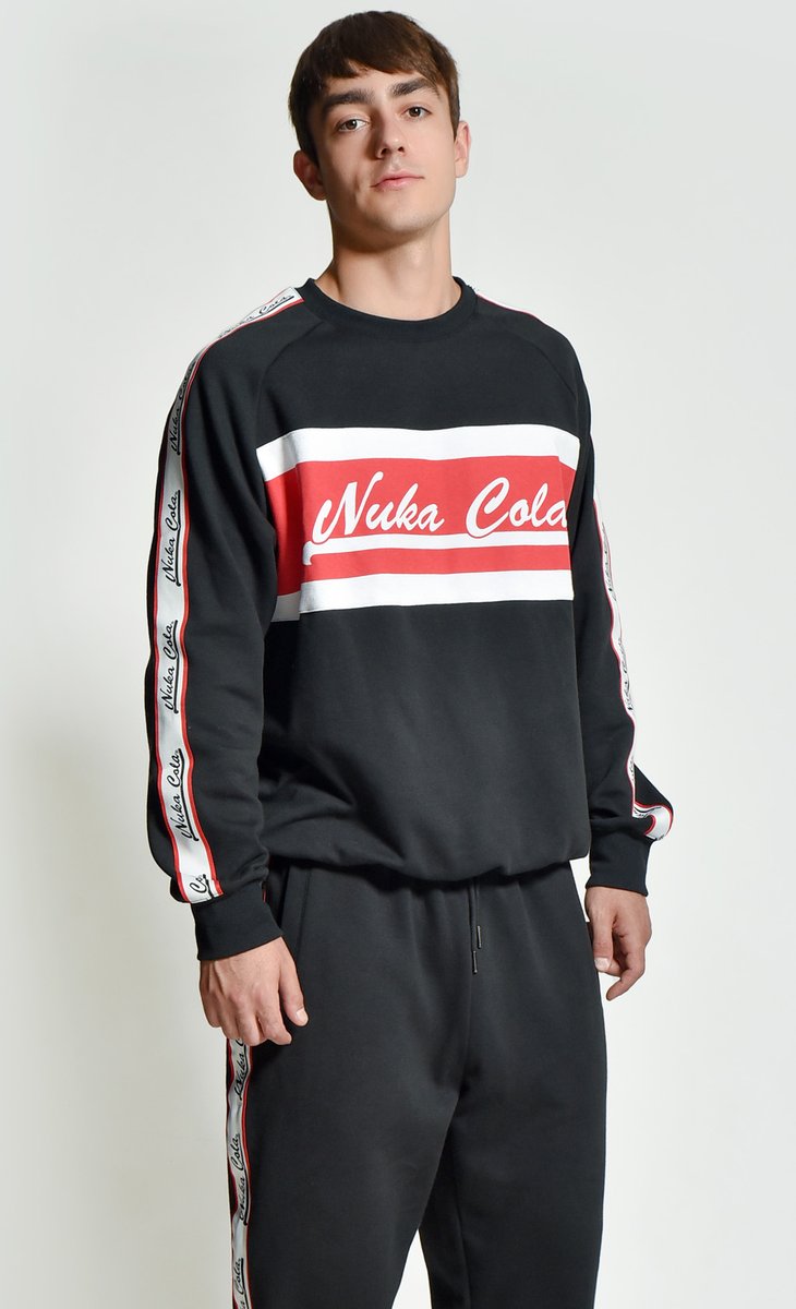 Fallout's tweet photo. New Year, new you!

This year we’re celebrating all things Fallout with monthly giveaways! RT this post, &amp; comment below your New Year resolution to be entered for a chance to win a Nuka-Cola Jogger and Sweatshirt from @InsertCoinTees!
#OpenTheVault https://t.co/zvzkY2d9Pu