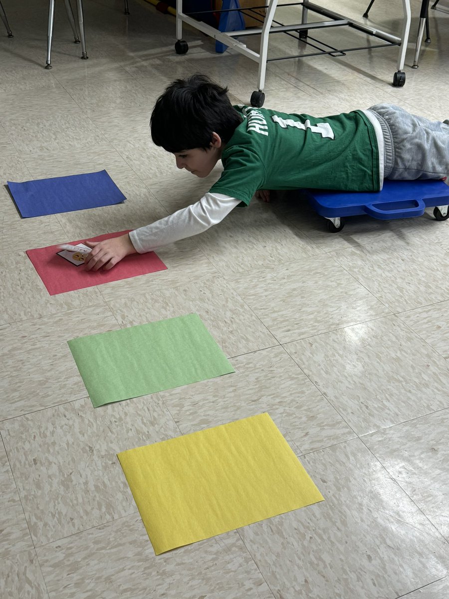 KelliWerner's tweet photo. In OT Group today, students worked on emotional and sensory regulation. They did an activity to match emoji puzzle pieces to the corresponding zone while working on upper extremity strength to propel themselves on a scooter. #cliffwoodproud #greatwork💪 https://t.co/iyrgy6MLdN