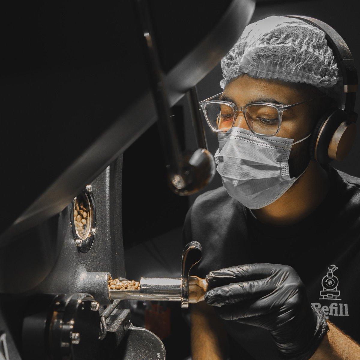 refillroastery's tweet photo. Mastering the roast, one check at a time! Our dedicated roaster Samundra ensures every bean reaches its perfect hue and aroma. Precision meets passion in every roast. 🌟☕ #RoastingPerfection #CoffeeCrafting #RefillQuality https://t.co/W3kQ9XOuSb