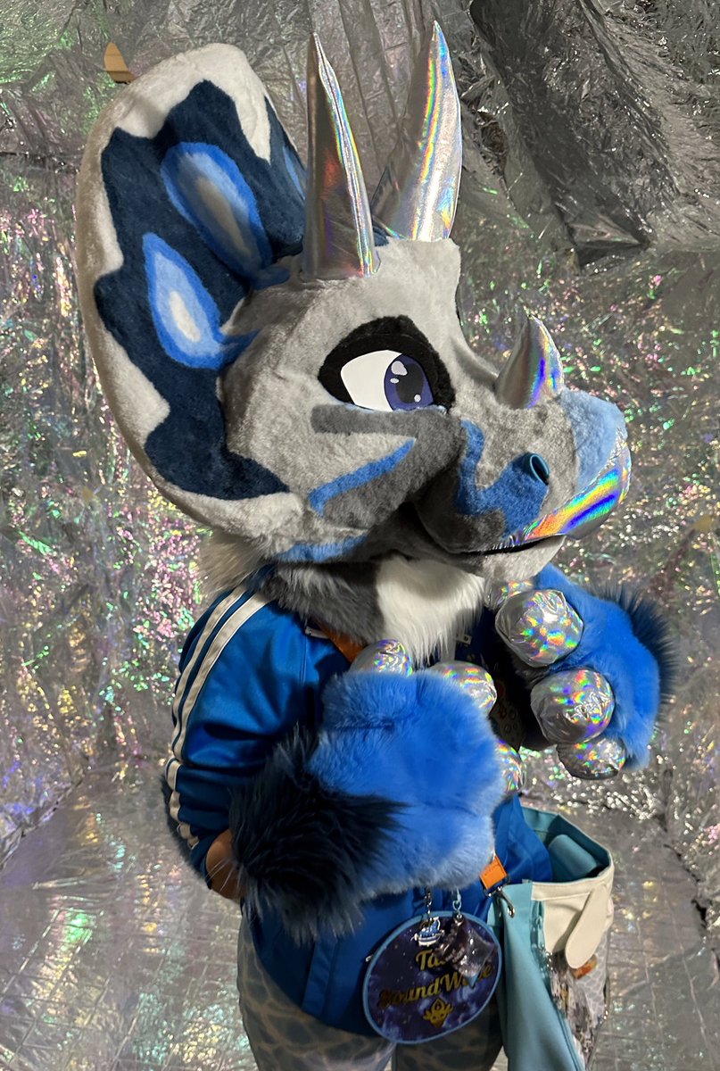 TaliSoundWave's tweet photo. Happy Fursuit Friday! I haven’t gotten a chance to introduce my new suit Glimmer, the Holographic Triceratops!! 
Maker:  https://t.co/cvYkFPUXS2 

#fursuitfriday #dino #furry #triceratops #fursuit #talisoundwave #ritzcostumes https://t.co/uMWvFT6mOD