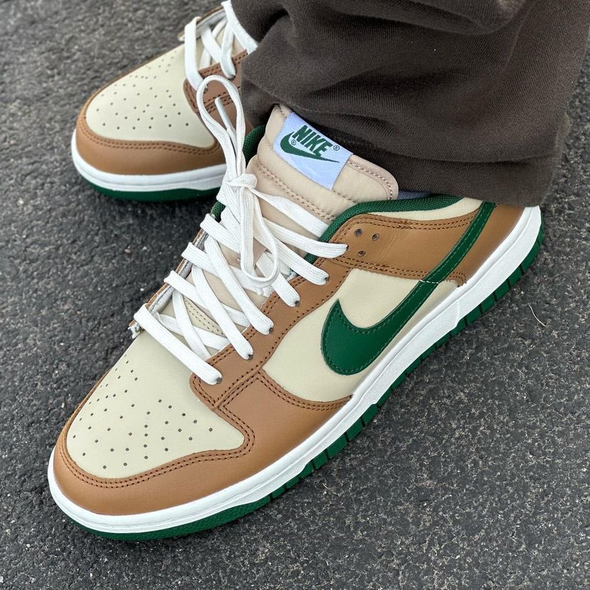 Few sizes remaining 🌲 Nike Dunk Low 'Rattan/Gorge Green' => bit.ly/48qS7uH