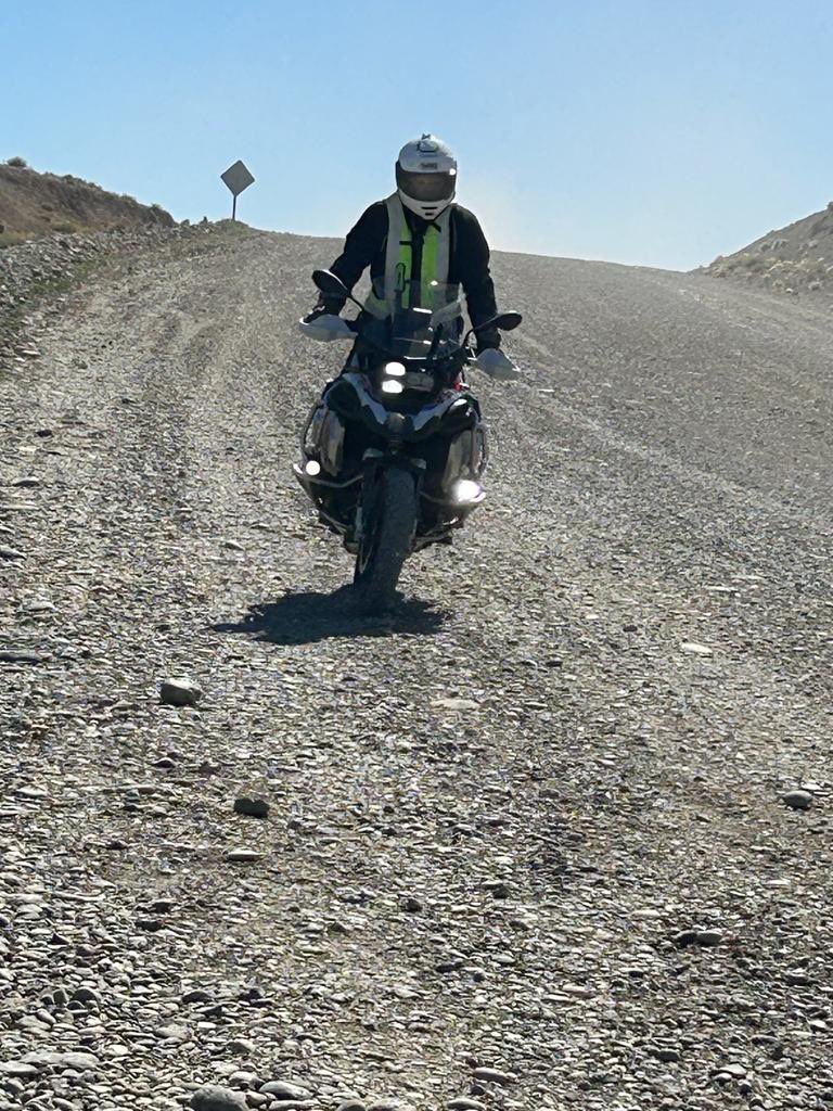 No1GhostDog's tweet photo. Yesterday was the day from hell! 300km of roads of which over a 100km was gravel and in stretches deeply rutted - oh along with gusty wind too. But maybe the beer and view at the end was worth it 🤔 #Route40 🇦🇷 https://t.co/baja6uBCmF