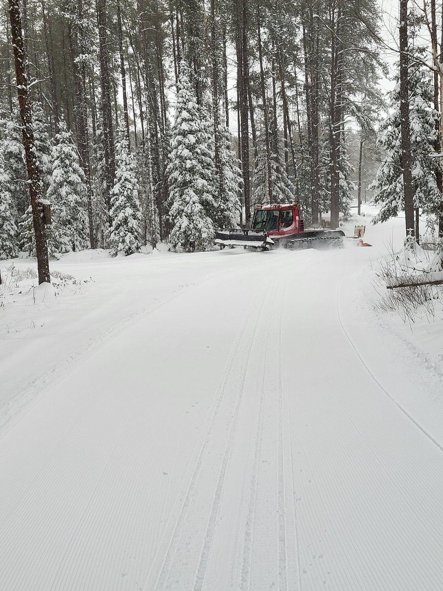 With all this fresh snow we are able to get out the pistenbully. The green and blue trails will be groomed and track set by this afternoon.