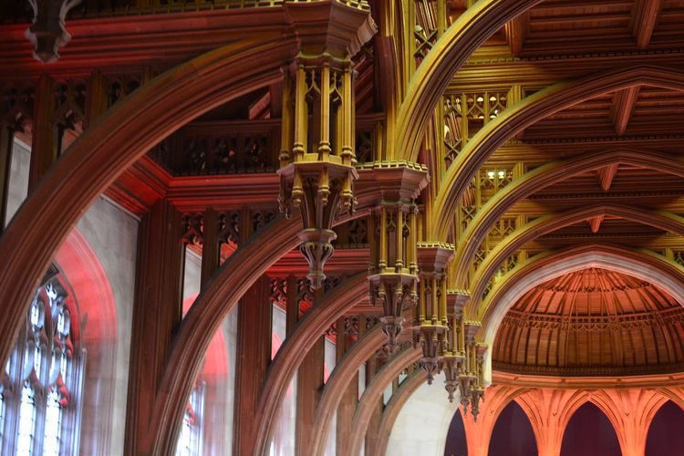 Hammerbeam roof is cantilevered out from the wall and supports an upright hammer-post, which in turn carries the upper roof structure, creating a very wide internal span. In churches, the hammerbeam ends are sometimes decorated with angels.