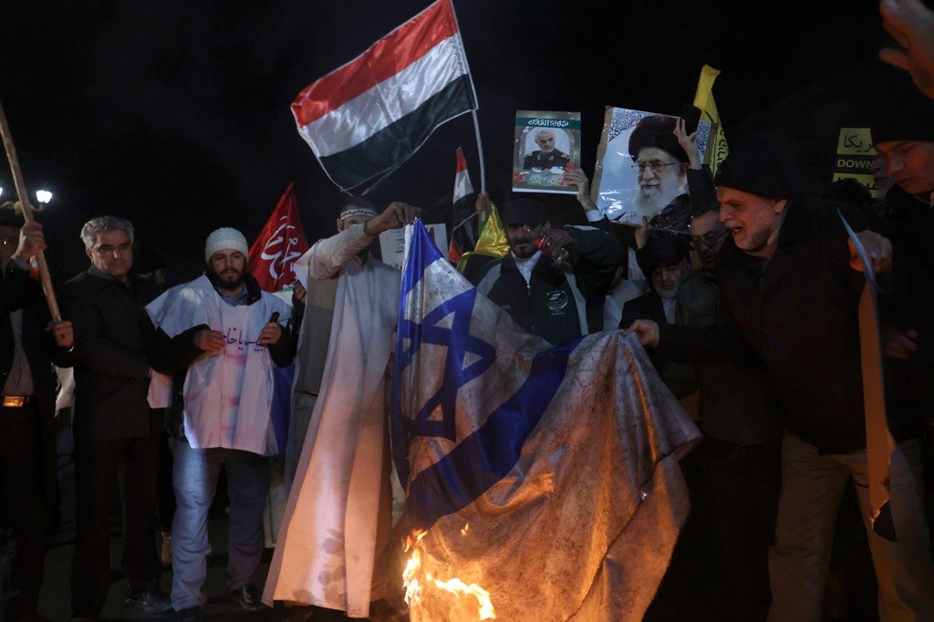 hg_may's tweet photo. Protesters burn flags of these countries during anti-US, British and Israeli protests in Tehran https://t.co/s9FUxpeyh8