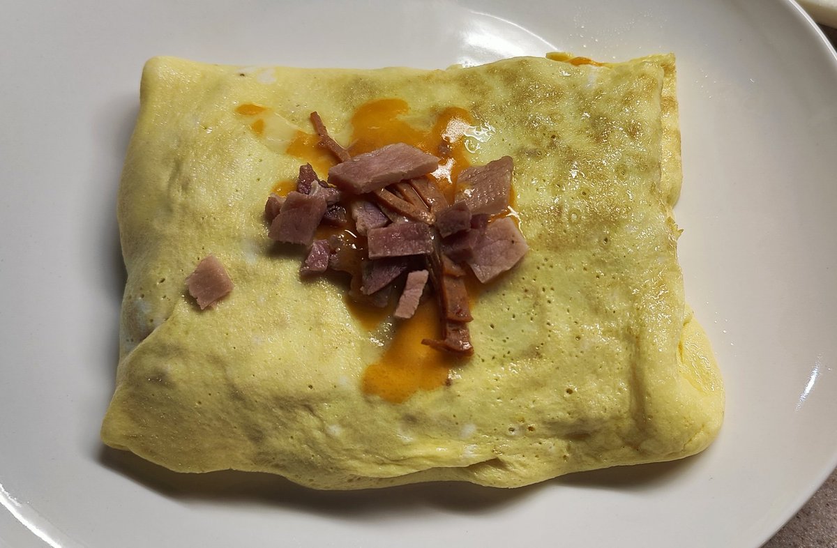 Just got back in from shoveling at that white stuff. I'm tired and hungry now. Haven't made a ham and cheese omelette in a long time. What's your favourite breakfast food? #eggs #omelette #breakfast