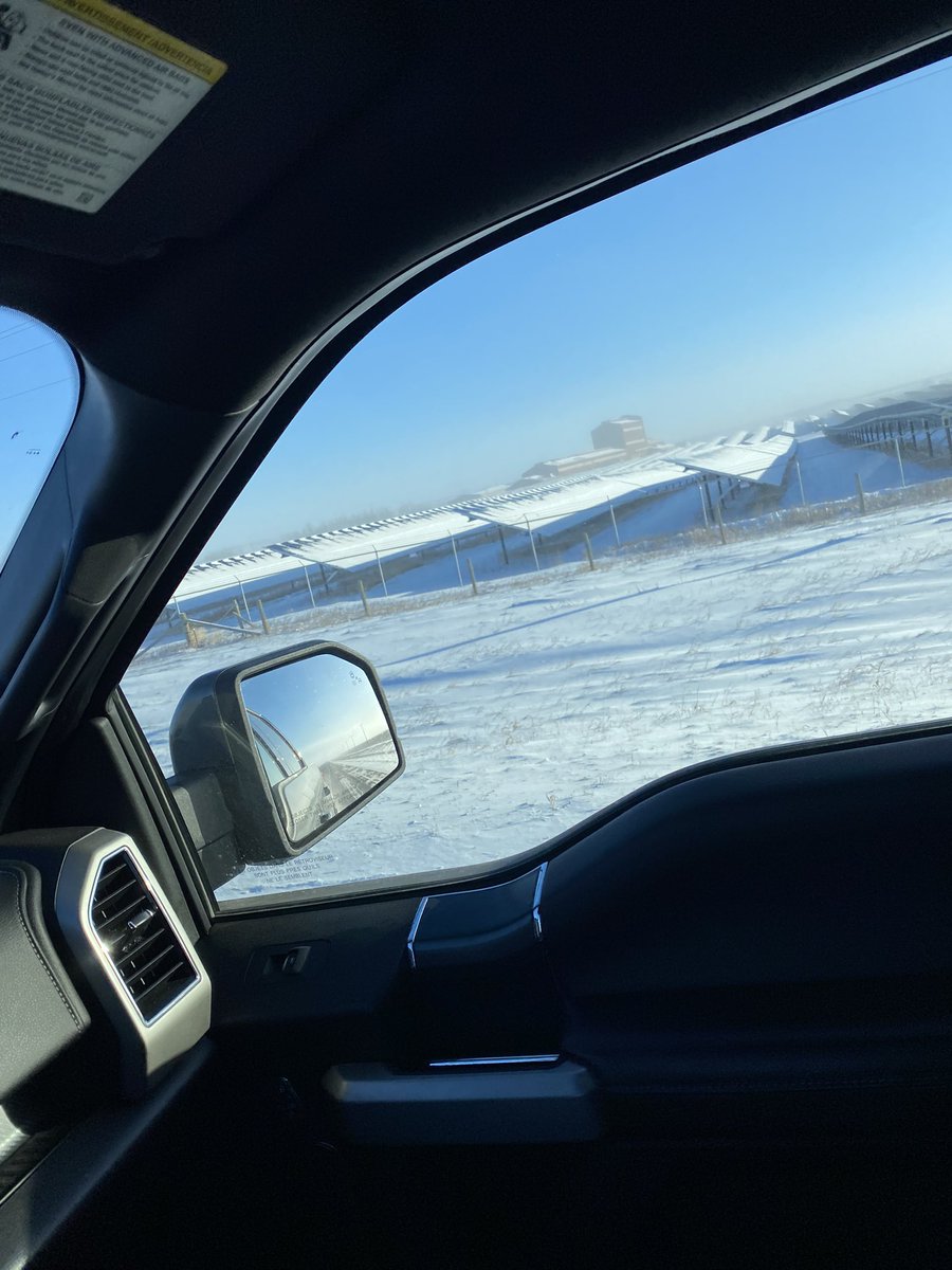 JasonMevel's tweet photo. @HarrisBerton @Ember421 This morning between High River and Okotoks, a 1 sq mile solar array and they can’t be bothered to send people to clear the panels.  The O&amp;G industry has thousands of people out working to ensure reliability, and Solar can’t even expend bare minimum effort to supply the grid. https://t.co/FWaOoTn9UN