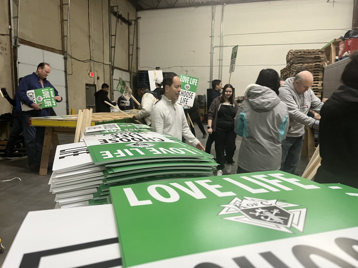 dckofc's tweet photo. Today, DC Knights and families are working together to prepare thousands of iconic @KofC signs for next Friday’s nat’l @March_for_Life in our Nation’s Capital. #knightsinaction https://t.co/NguRs3s7sA