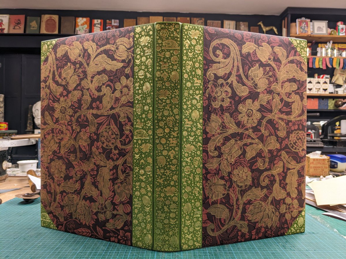 Festooned animal binding with decorative paper by J & J Jeffrey #books #bookbinding #decorativepaper