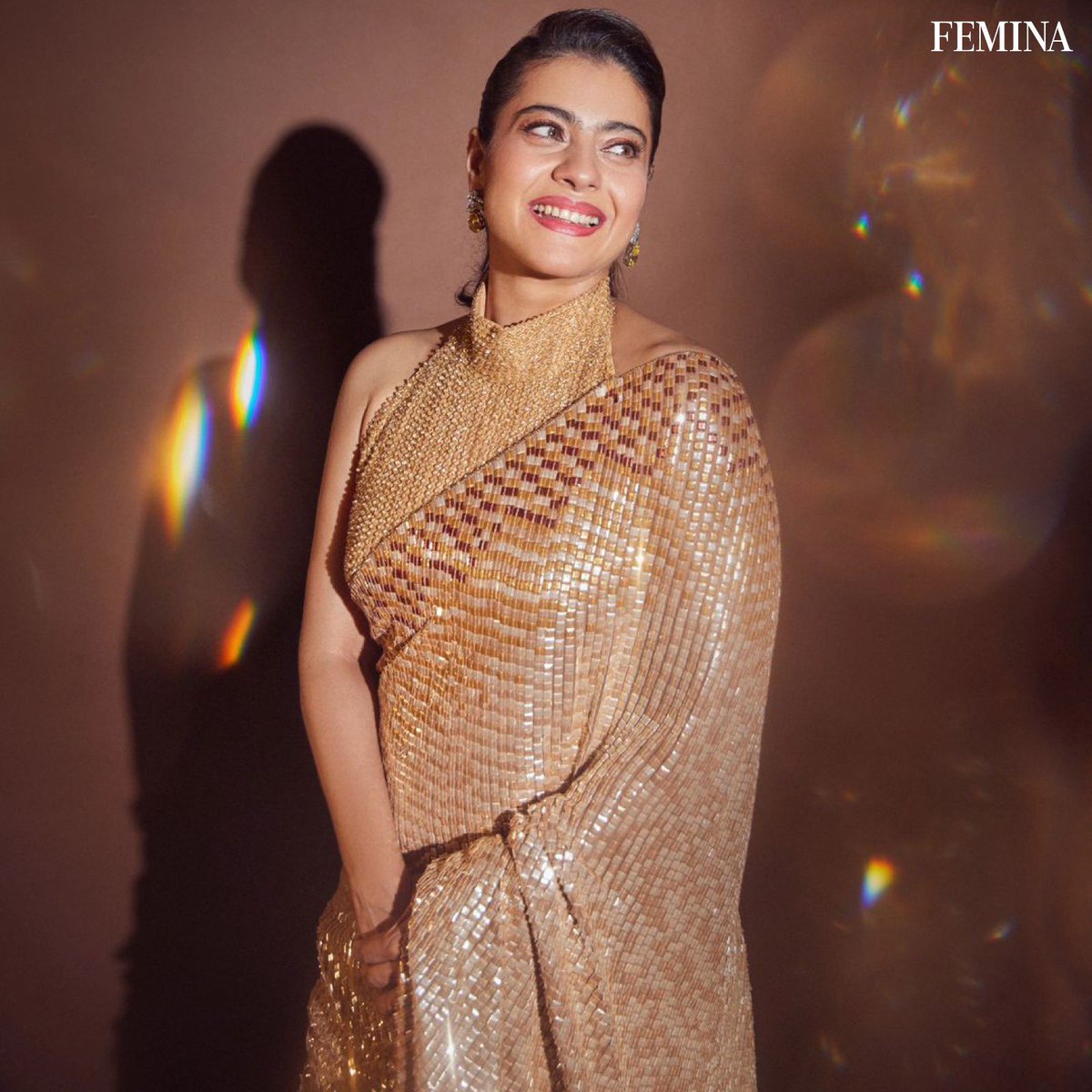 Draped in elegance and shimmer, Kajol Devgan graces Instagram in a stunning golden saree. ✨🌟 #GoldenElegance #KajolDevgan #Entertainment #Femina