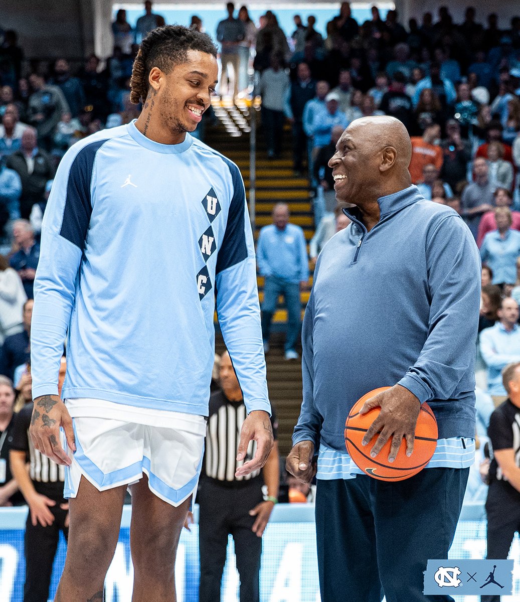 UNC_Basketball's tweet photo. Special moment here in the Dean Dome 🙌

Phil Ford presents Armando Bacot the game ball from his 2,000th point scored at Pitt. https://t.co/PLBx3X4p4g