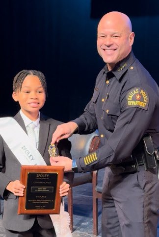 ClariceFox4's tweet photo. Dallas Police Chief Eddie Garcia was a judge for the Foley & Lardner MLK Oratory competition. The winner, 9 yr. old Aiden Body wants to be a police officer, his cousin is an officer. Chief Garcia pinned his badge on Aiden’s suit. The 4th grader said that was Cool. #foleymlk https://t.co/B9dGIW3pSQ