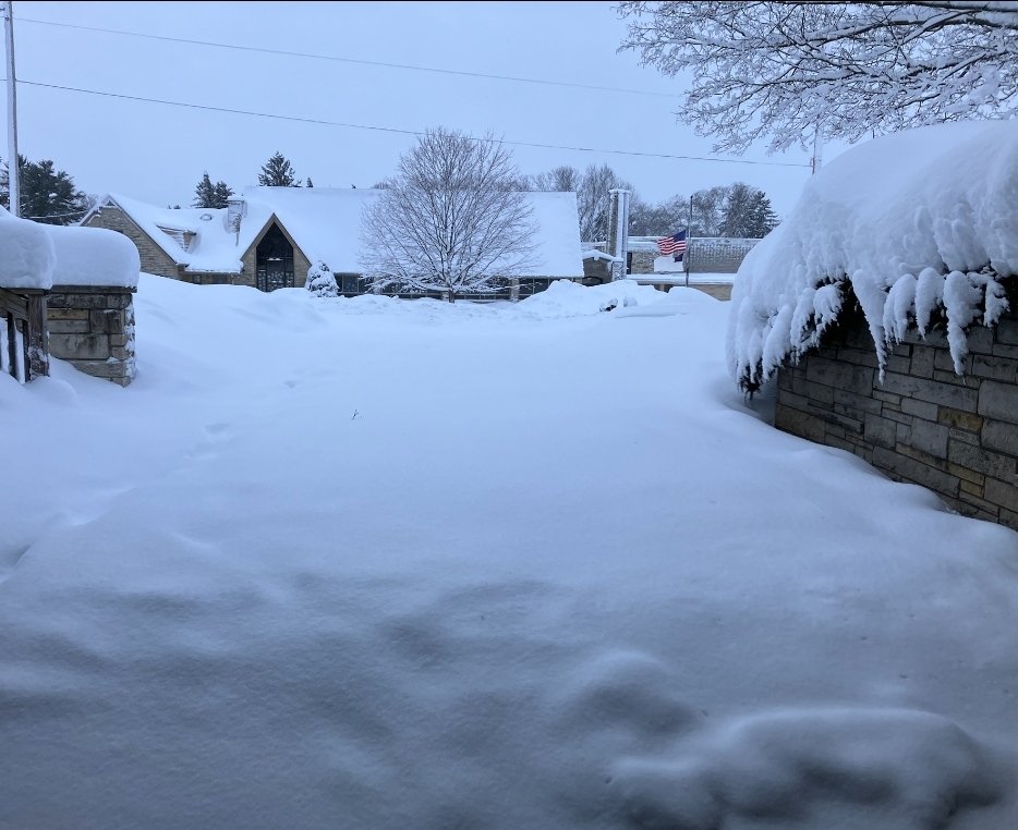 NotKennyRogers's tweet image. On the left is liberal hero Greta Thunberg angrily telling everyone the world will end in 2023 due to global warming.

On the right is the current view from my brother's garage in Milwaukee.
