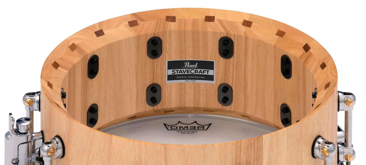 PearlDrumCorp's tweet photo. Pearl StaveCraft Snare Drums boast a mammoth 25mm thick shell made entirely of meticulously beveled solid exotic wood staves. 

Pearl StaveCraft Snare Drums boasts a mammoth 25mm thick shell made entirely of meticulously beveled solid exotic wood staves. channel, increasing total shell strength by 50%. The shell is then lathed to a perfectly round 25mm thickness, hand-lacquered, and fitted with our Swivel Tube Lugs and MasterCast diecast counter hoops for added volume and tuning precision.

StaveCraft snare drums are available in three shell types and two sizes for the perfect fusion of classic craftsmanship and new-school performance.

• StaveCraft 14x6.5 Makha w/Thai Oak DadoLoc
• StaveCraft 14x5 Makha w/Thai Oak DadoLoc
• StaveCraft 14x6.5 Thai Oak w/Makha DadoLoc
• StaveCraft 14x5 Thai Oak w/Makha DadoLoc
• StaveCraft 14x5 Ashwood w/Makha DadoLoc
• StaveCraft 14x6.5 Ashwood w/Makha DadoLoc