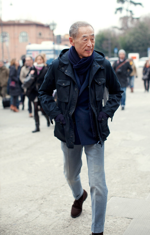 for the last 10 years, maybe longer, this guy has shown up at the menswear trade show Pitti Uomo wearing essentially the same outfit: a tonal blue top, blue or grey pants, and suede shoes. and he always looks great. his name is Noboru Kakuta