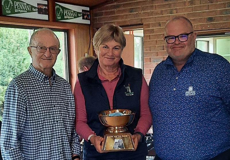 Trentham_GC's tweet photo. The new trophy for the Neil and Judy Rothie mixed 4bbb knockout. It’s a cracker. Neil presenting to 2023 champs Alison Borchers and @smovenden https://t.co/4s6GXFPlJR