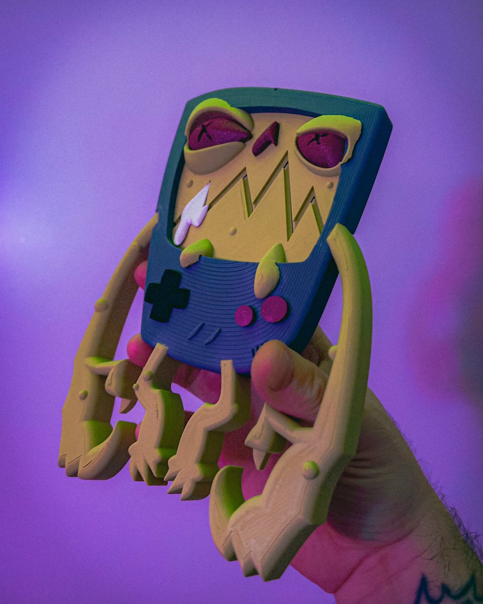 GrazCore's tweet photo. Look at these lil fellas! Huge thank you to my wife’s cousin for making these 3d printed Zombie Gameboys originally designed for me by @squeedgemonster. I love when art inspires art! https://t.co/GMVTmsoNp8