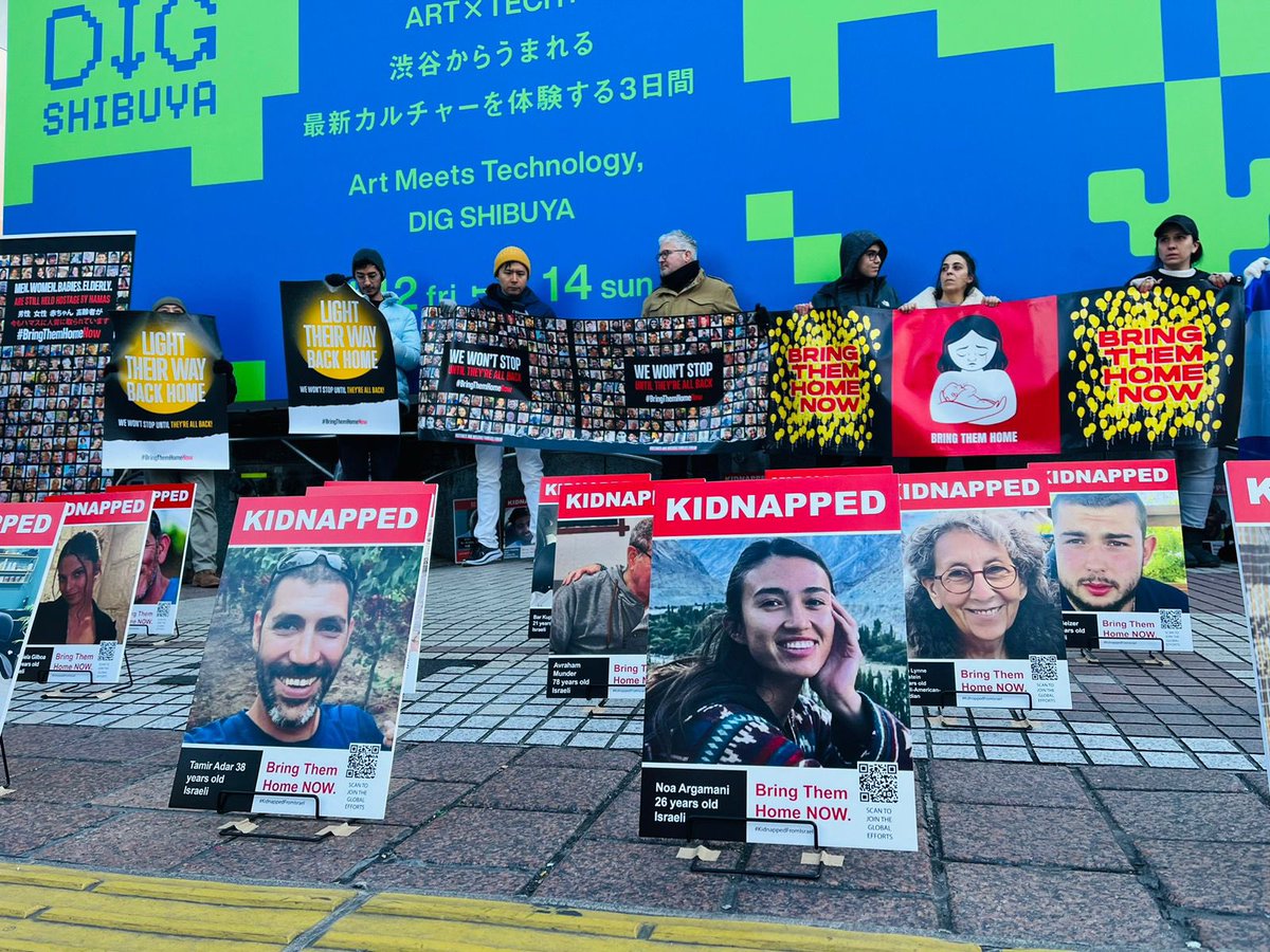 IsraelinJapan's tweet photo. From the youngest hostage, a one year old baby, to the oldest one at 86, women and men. It has been 100 days since October 7, and 136 hostages are still held by the terrorist organization #Hamas in Gaza. Today we stood in #Shibuya, ensuring their voice is heard.

We must #BringThemHomeNow, we must make sure that they reunite with their loved ones.🎗️

 #100DaysInCaptivity