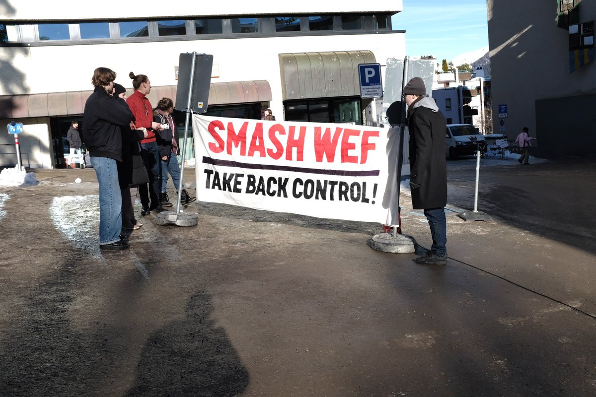 RaimondLueppken's tweet photo. Protest against #WEF at Postplatz in #Davos. #StrikeWEF #Davos1401 Picture 1 @nicola_siegrist talking to Swiss TV/radio @SRF. @klimastreik @spschweiz @JusoSchweiz @DebtforClimate https://t.co/CEVHJD7saP