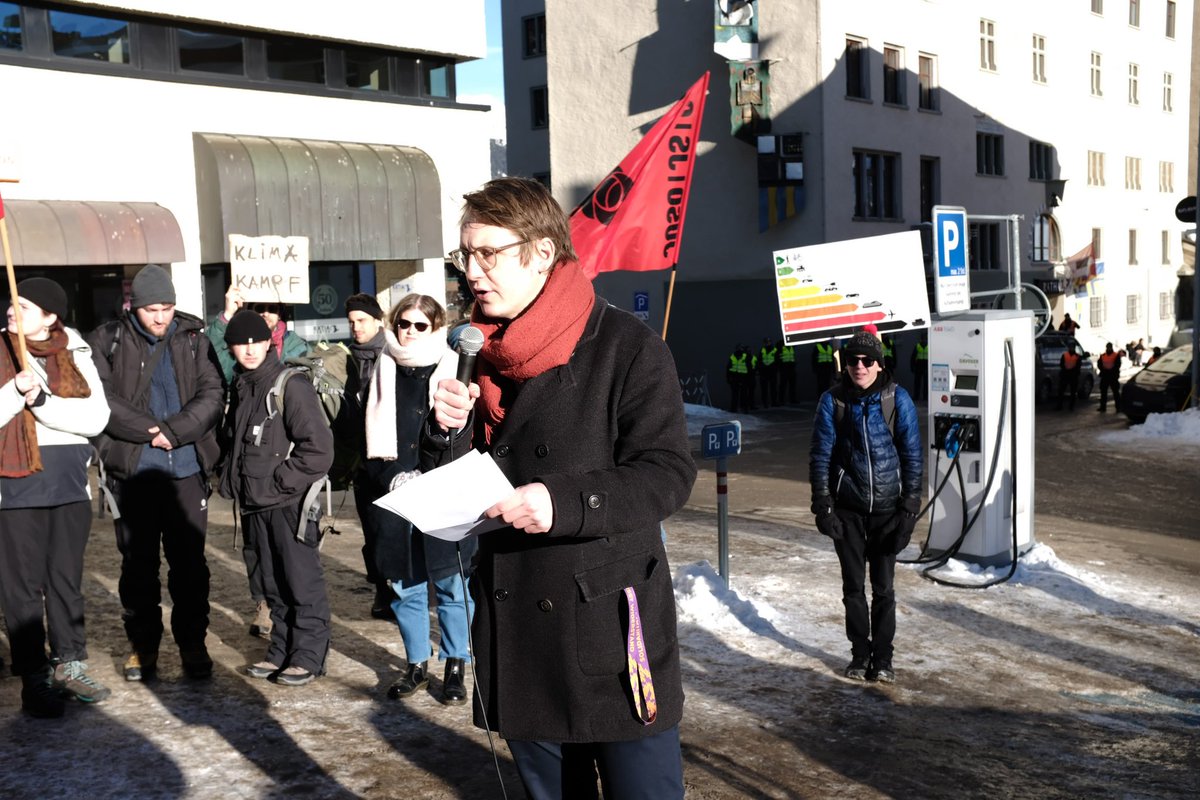 RaimondLueppken's tweet photo. Protest against #WEF at Postplatz in #Davos. #StrikeWEF #Davos1401 Picture 1 @nicola_siegrist talking to Swiss TV/radio @SRF. @klimastreik @spschweiz @JusoSchweiz @DebtforClimate https://t.co/CEVHJD7saP