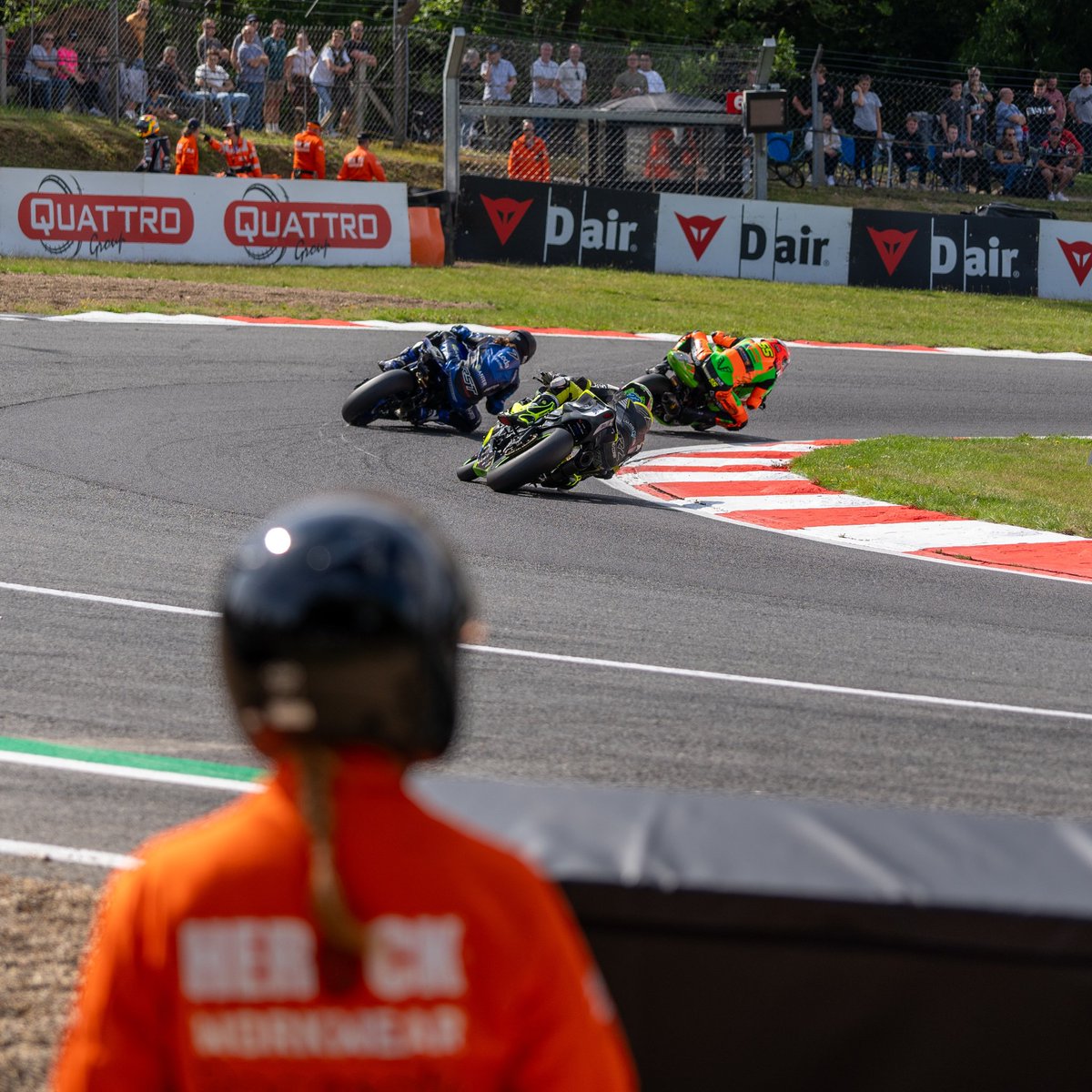 cathyquelcutti's tweet photo. For the love of the sport 🧡

#orangearmy 
#brandshatch 
#bsb
#herockworkwear 
#britishsuperbikes #racesafe https://t.co/Ik3API1Xu5