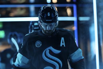 Larsson walking through tunnel