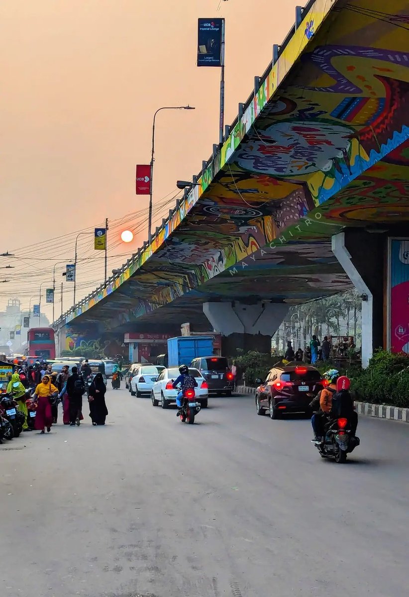 Colorful Dhaka City!

#MayaChitro #Bangladesh 🇧🇩 
#DhakaCity #CityLife #Dhaka #mobilephotography #streetphotography #photooftheday #pixelphotography #winter #streetlife #googlepixel #followers #dhakastreet #BeautifulDhaka #sunsetlovers #goldenhour #colorful