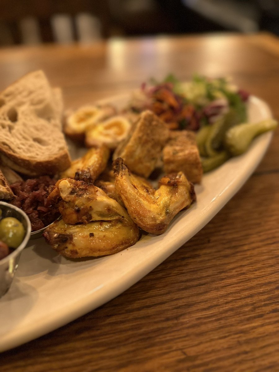 blue_boar_pub's tweet photo. Can’t decide on what to have? Then why not have a bit of everything? Our meat sharer comes with Spicy Chicken Wings, Pork &amp; Apple Scotch Egg, Sausage Rill, pickles, olives, chutneys and toasted sourdough! De-lish! #food #sharer #pub #youngschefs @youngspubs https://t.co/j1wjGIhWsb