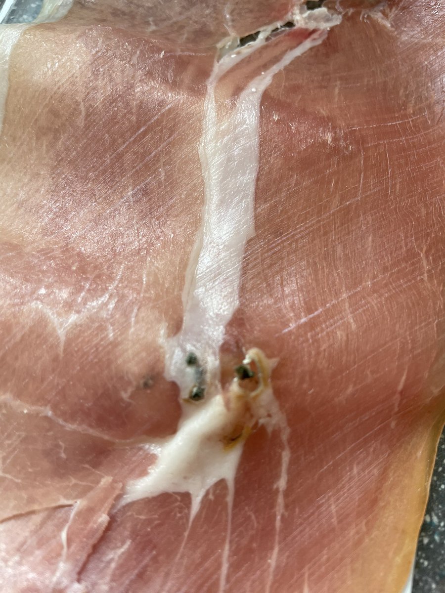 ijas666's tweet photo. @marksandspencer not sure what this was in my Parma ham. Deffo didn’t look appetising. Was on all four slices. Don’t have time to take it back sadly. didn’t have a receipt. Did use my sparks card though. https://t.co/T6wTlNvchf