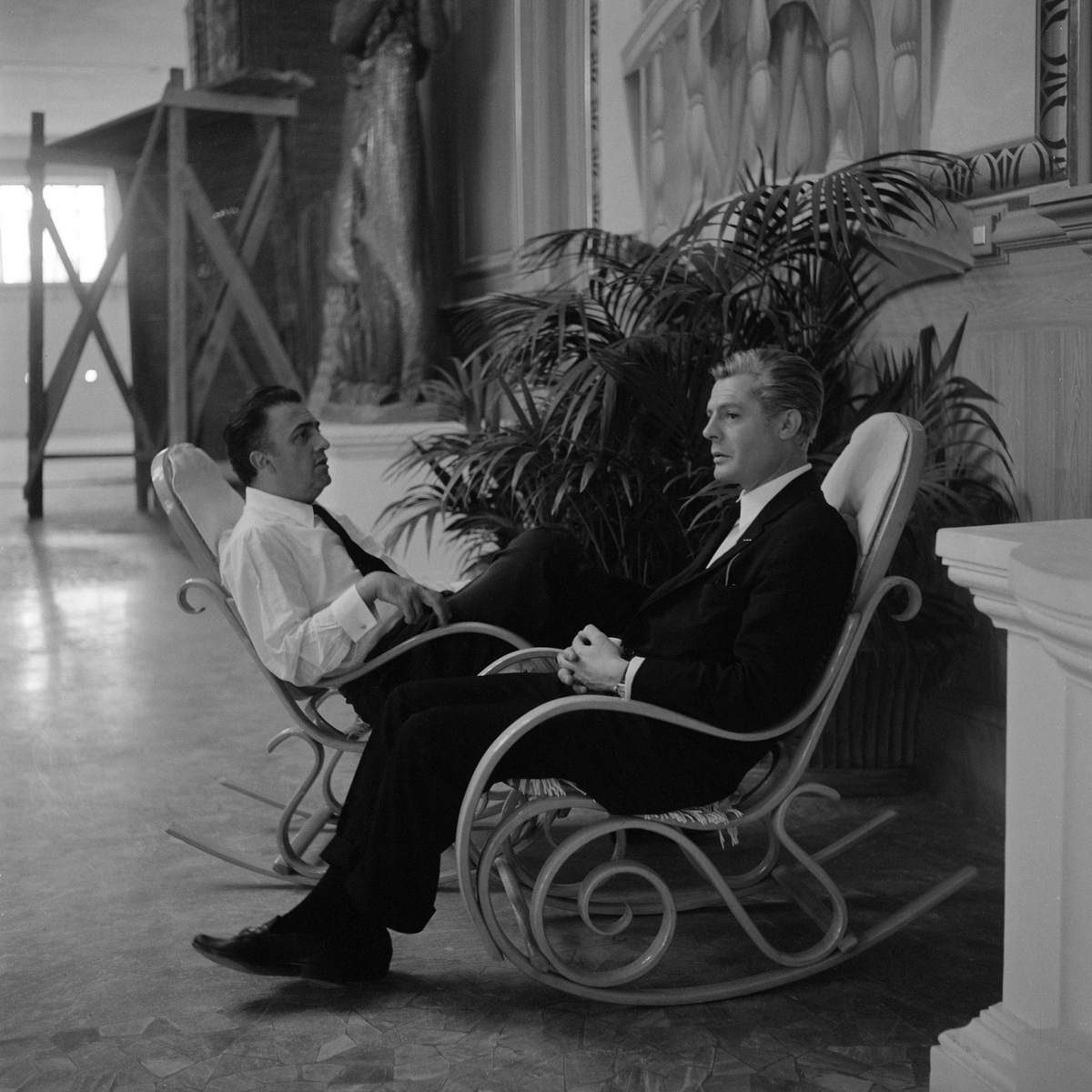 Federico Fellini &amp; Marcello Mastroianni during the filming of "8½" (1963)