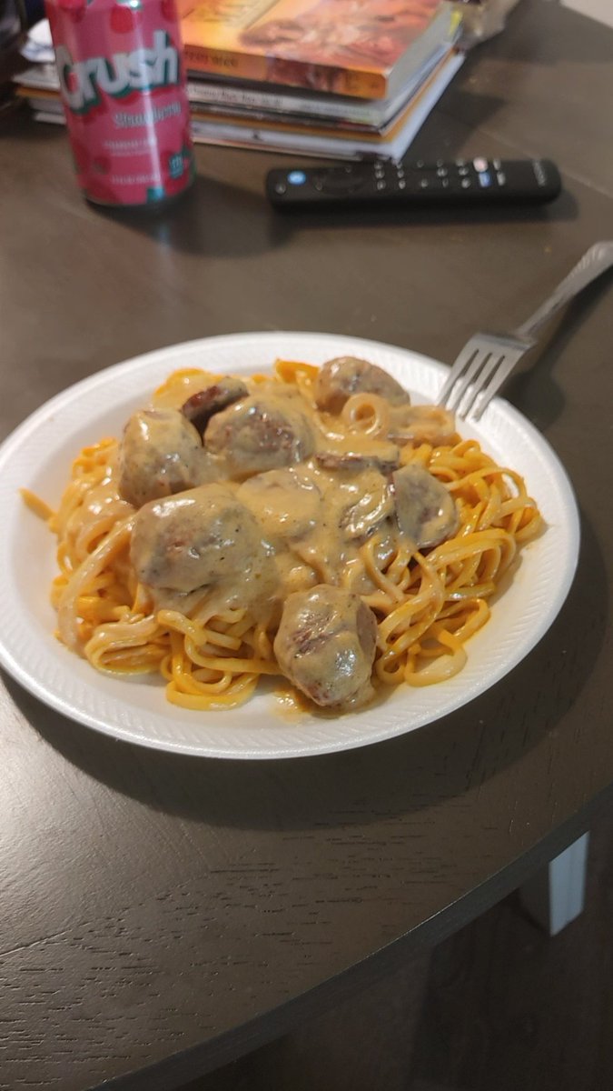 Freshly prepared 1/27/2024 (10:45 am) Linguine pasta slowly simmered. paired with andouille sausage, aidells teriyaki, and pineapple chicken meatballs, low-key stewed in alfredo sauce, garlic paste, onions, and an array of seasonings It would be nice to share it but ppl are weird
