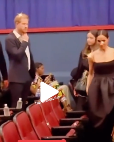 Look at HAZ!!!  He's Holding BACK the BILE Rising in his Throat when he Realizes he and #MeghanNobody HAVE to sit in the 8th Row CHEAP SEATS!  🤢🤢😱🤣🍿

#BobMarleyOneLovePremier #BobMarleyOneLoveMovie #BobMarley 
#MeghanMarkleThinksShesRoyal 
#MeghanMarkleGlobalLaughingStock