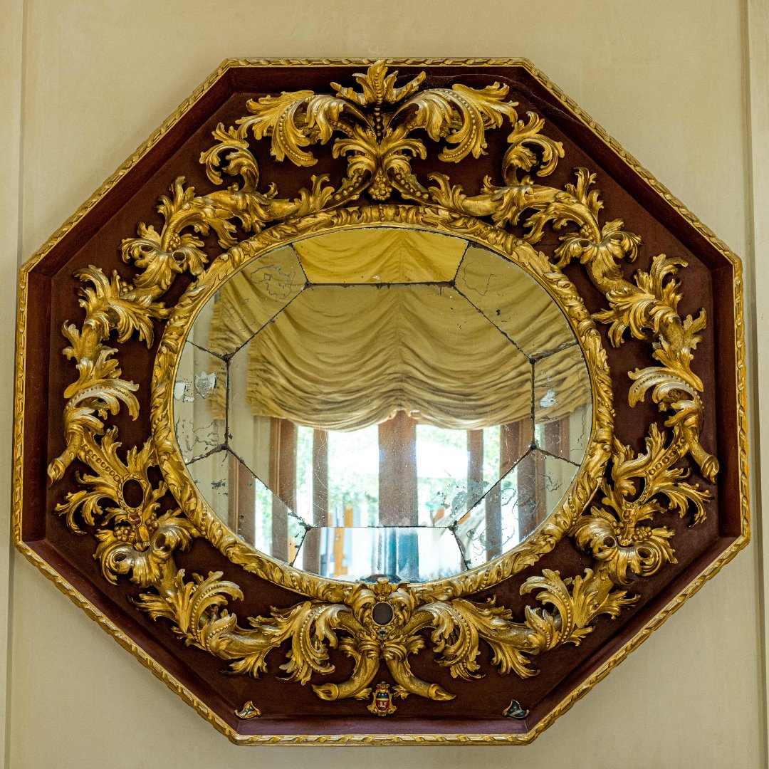 In: honoring traditions 
The Medici Mirror is one of our most beloved pieces. Known as an "engagement mirror," Margrit Mondavi and Baroness Philippine purchased this Baroque masterpiece together. The frame featured family portraits and debuted the new couple's crest.