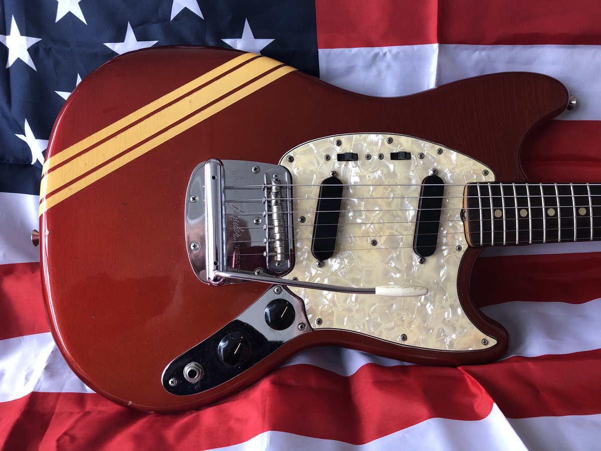 What an amazingly cool vintage guitar. CRAVE Guitars' groovy 1972 Fender Mustang Competition in metallic Competition Red. It plays as good as it looks. craveguitars.co.uk/.../feature-19… Truth, peace, love & music Love Vintage Guitars ❤️🎸