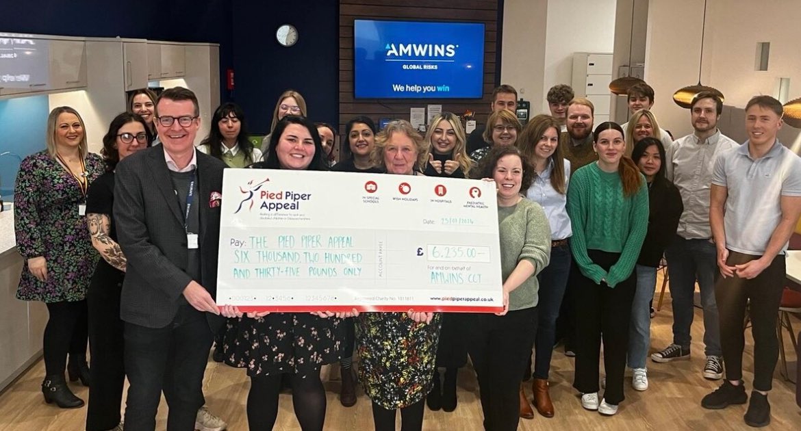 KazzyC63's tweet photo. Myself &amp; fellow #Amwins Cheltenham Charities Team giving cheque to @PiedPiperAppeal  £6,235 raised in 2023. Proud to be part of this, we couldn’t achieved this without the support of our colleagues.💜 #AmwinsGlobalRisks #amwins #piedpiperappeal #fundraising #charity #givingback https://t.co/lO1S6ASeqT
