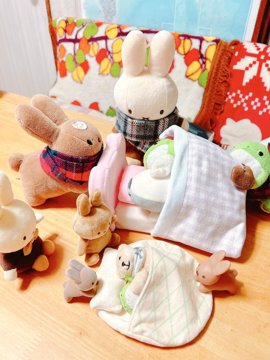 no humans stuffed animal stuffed toy stuffed bunny scarf rabbit indoors  illustration images