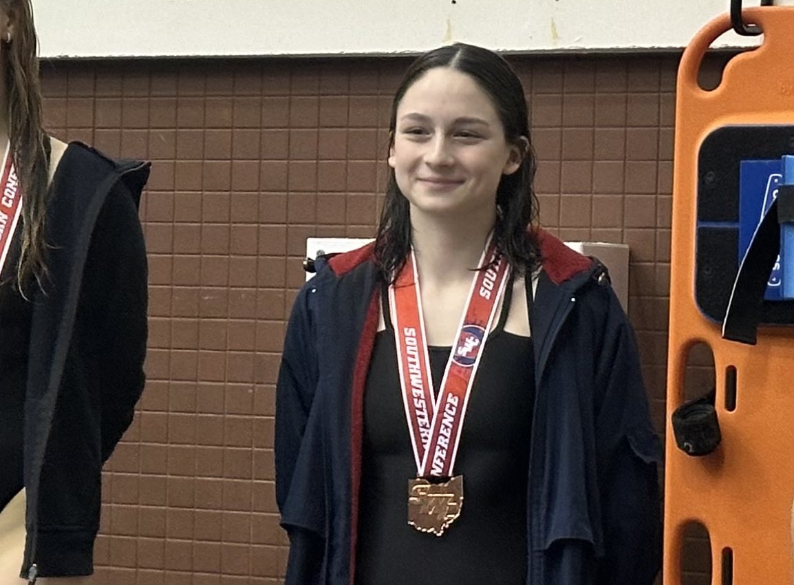 Reagan Henely places third in the 200 IM at the SWC Championship!