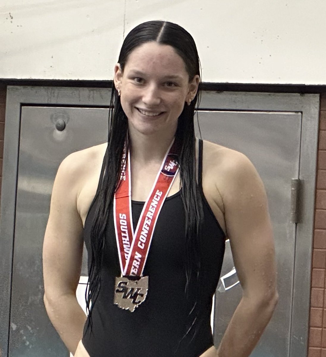 Grace Henely finishes runner-up in the 100 Butterfly at the SWC Championship!
