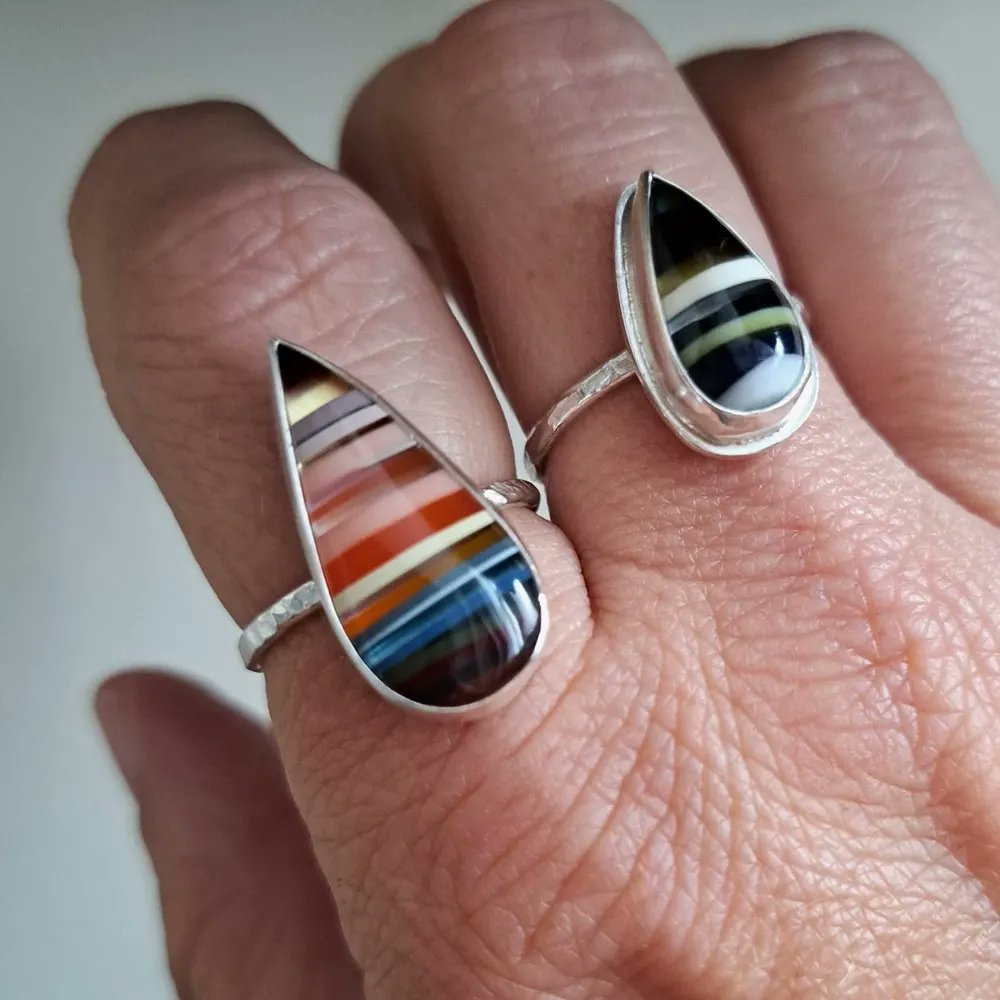 i_love_dolly's tweet photo. The green/black/white surfite ring sold yesterday 💃 so I have one #surfite ring left with blue, red and coral bands. This amazing material comes from excess resin/paint used to make handmade surfboards 🏄♀️ #EcoFriendly
https://t.co/k6XuBW0zqn
#UKGiftHour #UKGiftAM #shopindie https://t.co/2qjCATLyWL